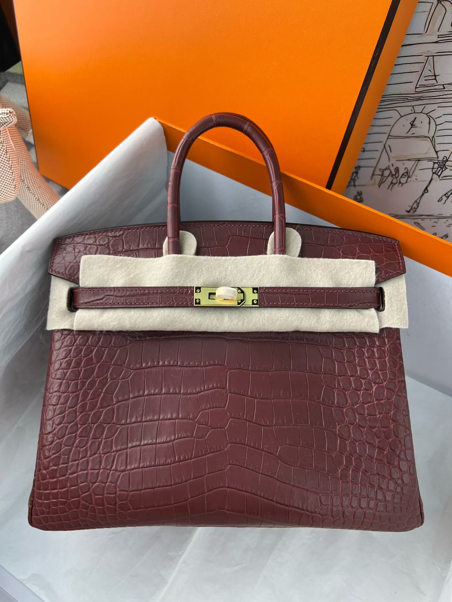 Bordeaux Matte Nile Crocodile Birkin 25cm, Fully Hand-Stitched Waxed Thread, Gold-Tone Solid Steel Hardware, Lambskin Lining, Custom Hot Stamping Available